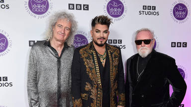 Brian May, Adam Lambert y Roger Taylor en 2022